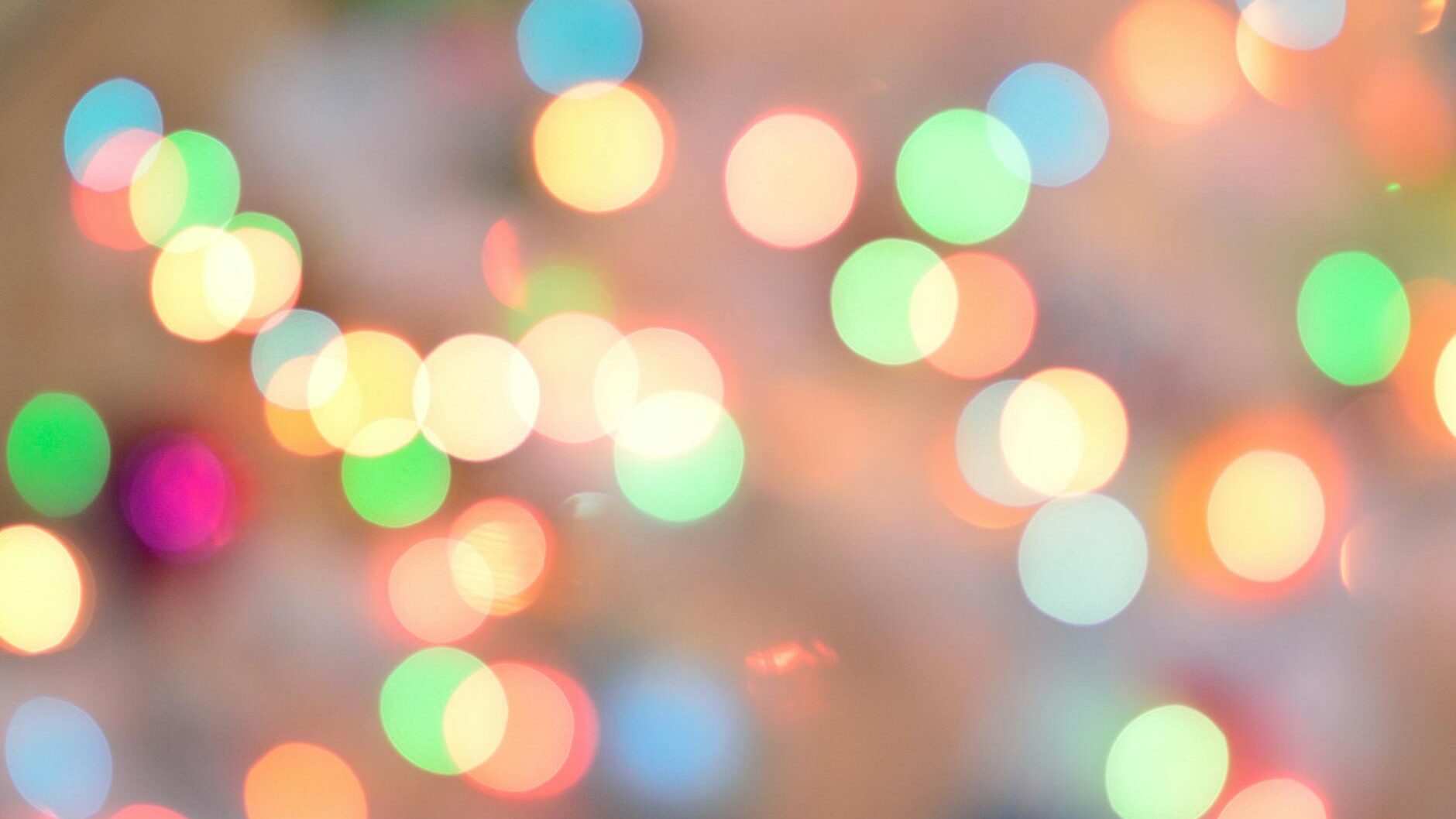 defocused image of illuminated christmas lights